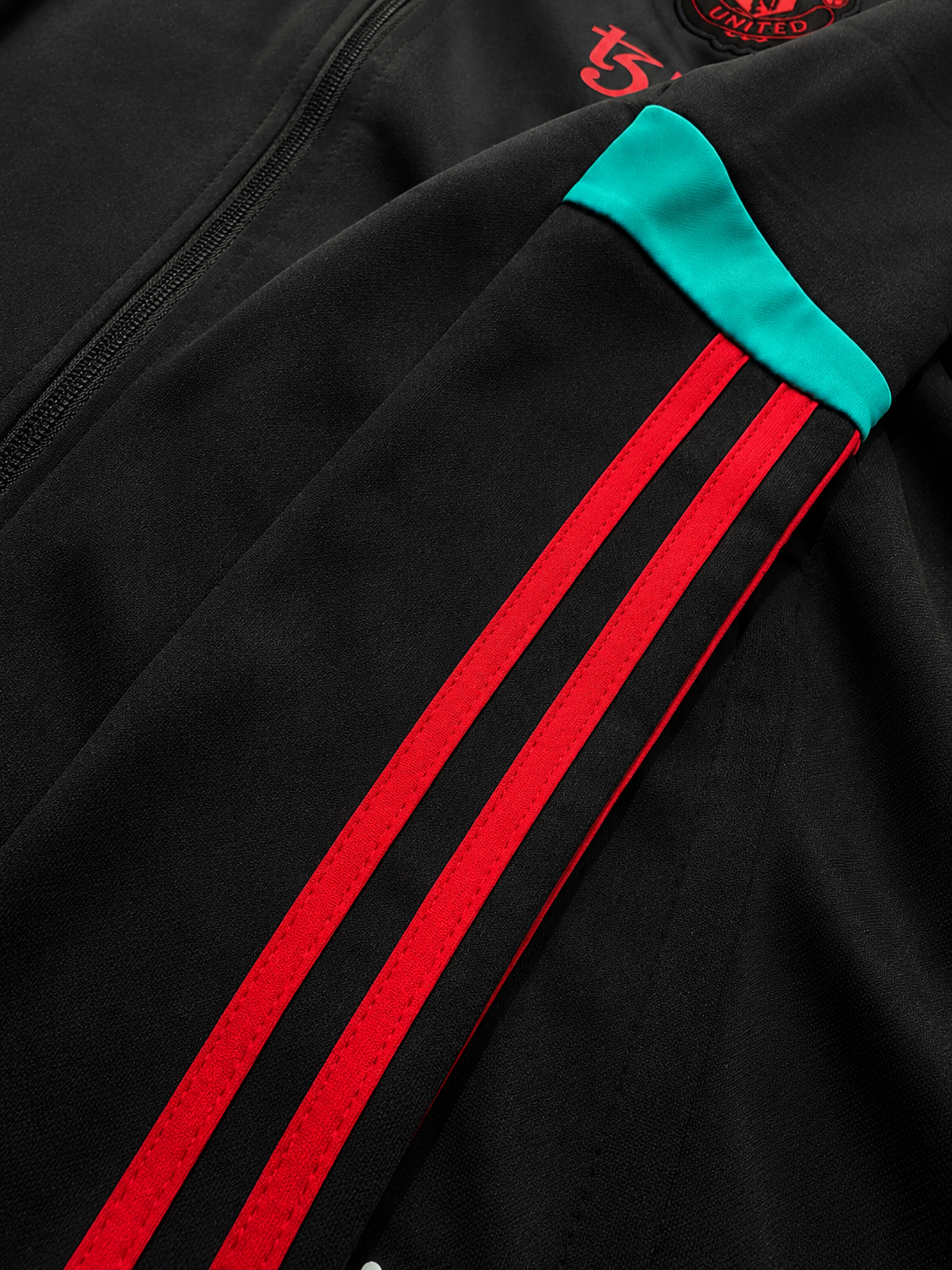 MANCHESTER UNITED BLACK TRACK JACKET | RED & TEAL STRIPED SPORTS JACKET