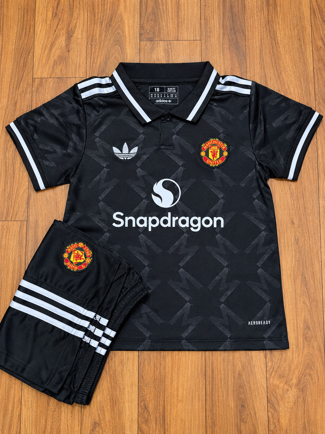 Manchester United Special Edition Black Polo kids Football Jersey & Shorts Set 2025–26