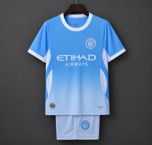 MANCHESTER CITY HOME 2026/27 KIDS SET WITH LOGO | KIDS FOOTBALL JERSEY & SHORTS
